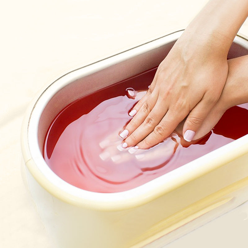 Dipping Hands in New Road Beauty Paraffin Wax for Smooth Hands